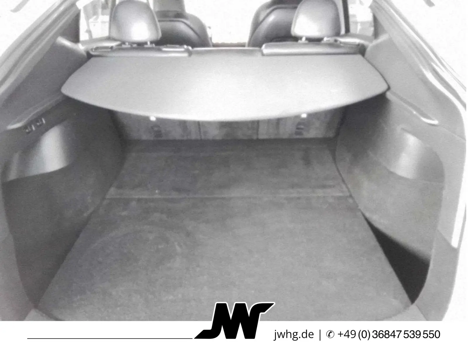 Tesla Model Y 4x4 378 kW Automatik Baujahr 2022, weiß, 130.789 km, Deutschland — Foto 10 von 11